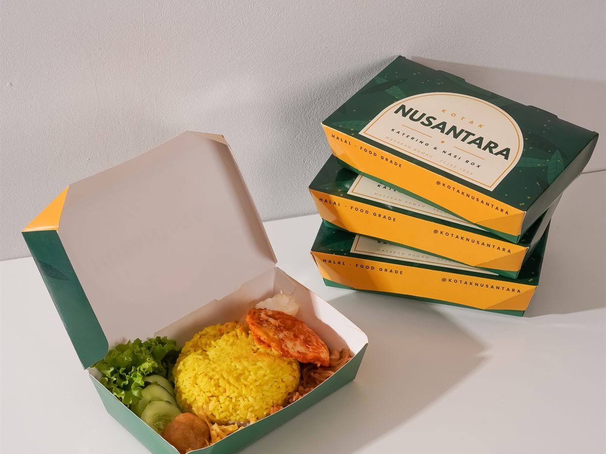 Example of a custom printed lunchbox with a catering brand design